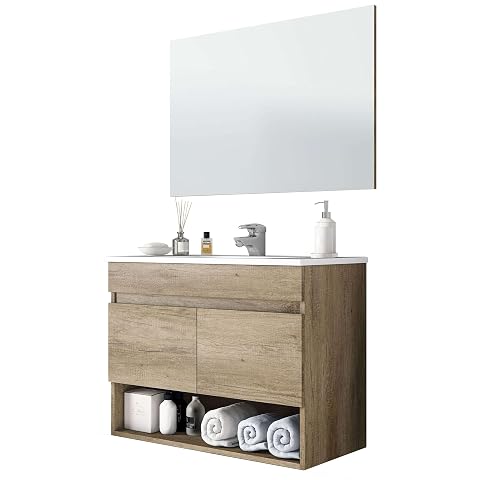 Meuble sous lavabo suspendu beige à deux portes avec miroir assorti dans une salle de bain lumineuse